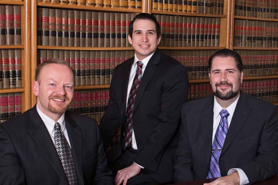Gabert, Williams, Konz & Lawrynk LLP layers sitting down and smiling