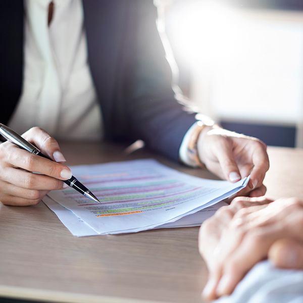 client and lawyer reviewing papers