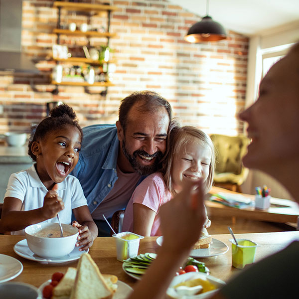 Parent eating with is children's